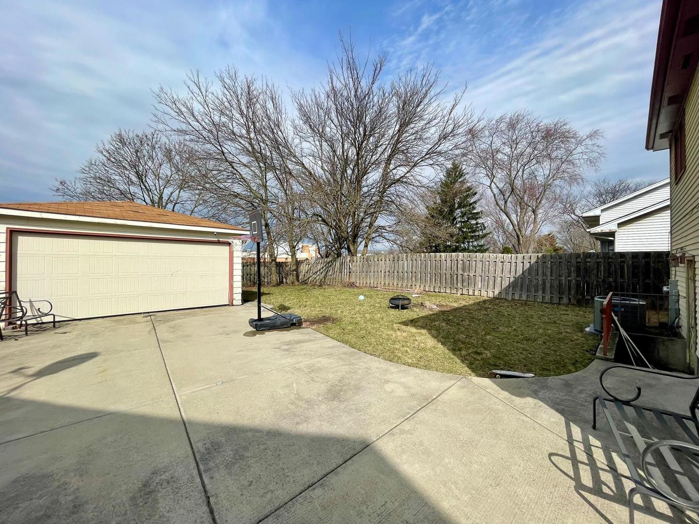 355 Pearson Circle Naperville, IL 60563 - Photo 18 of 19 a view of backyard of the house