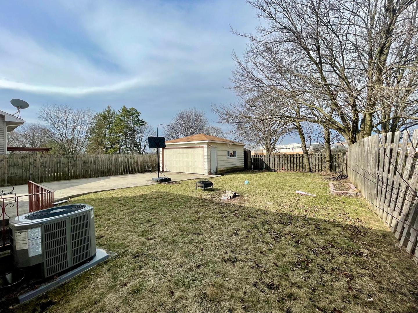 355 Pearson Circle Naperville, IL 60563 - Photo 19 of 19 a house view with a backyard space