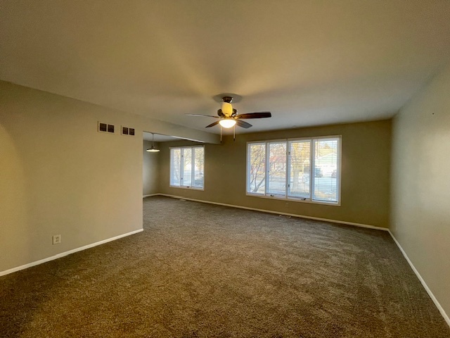 355 Pearson Circle Naperville, IL 60563 - Photo 2 of 19 a view of an empty room with a window
