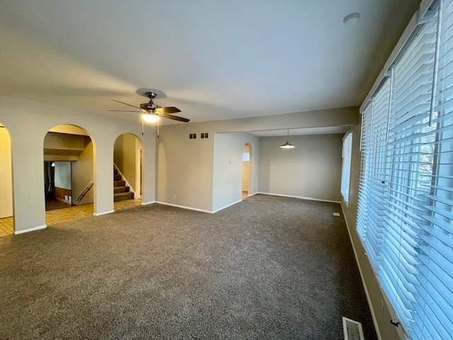 355 Pearson Circle Naperville, IL 60563 - Photo 3 of 19 a view of a room with a ceiling fan