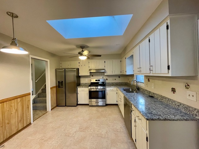 355 Pearson Circle Naperville, IL 60563 - Photo 6 of 19 a kitchen with stainless steel appliances granite countertop a sink stove and refrigerator