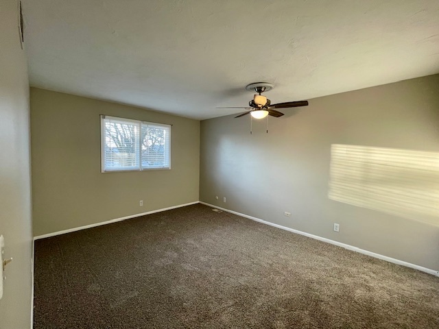 355 Pearson Circle Naperville, IL 60563 - Photo 9 of 19 a view of a livingroom with a ceiling fan and window