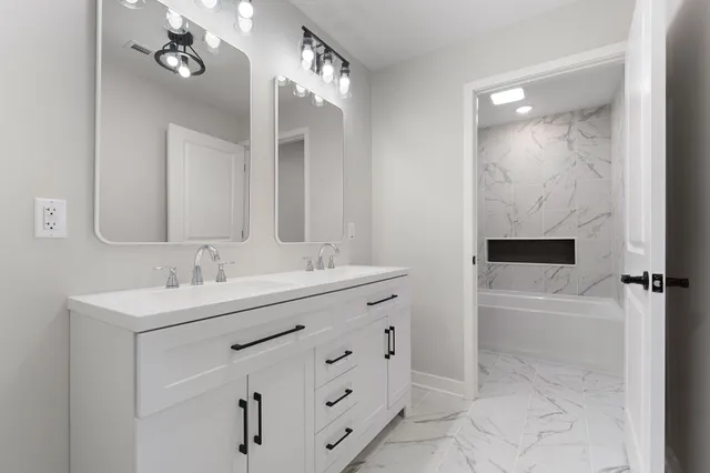 a view of a livingroom with furniture and wooden floor