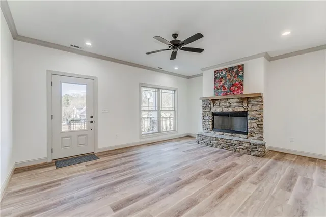 a bedroom with a large bed and a flat screen tv