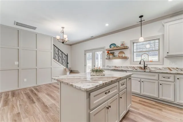 a view of an empty room with a ceiling fan