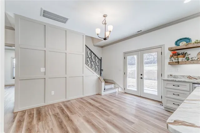 a view of a house with a snow in the background