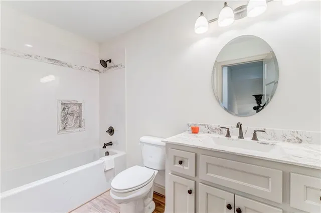 a street view with large trees