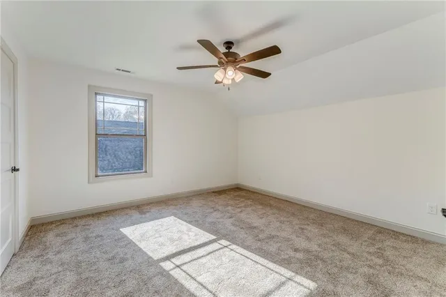 a view of a city street with a building