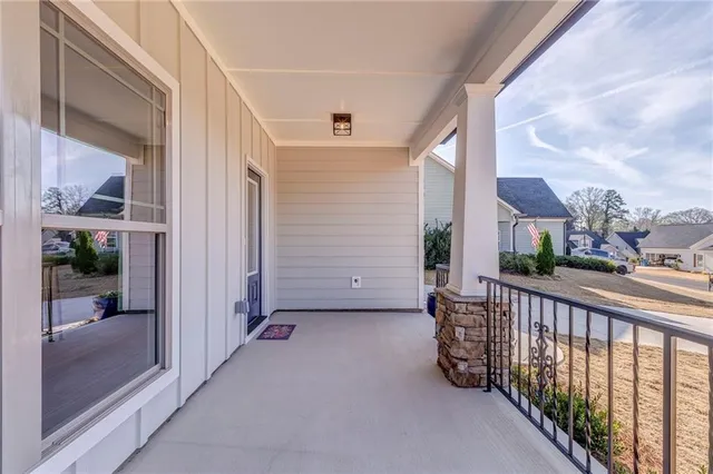 wooden floor in an empty room with a fireplace