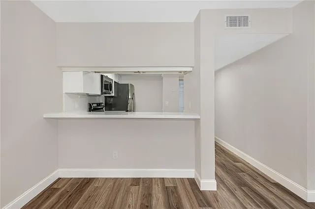a view of storage and utility room in closet