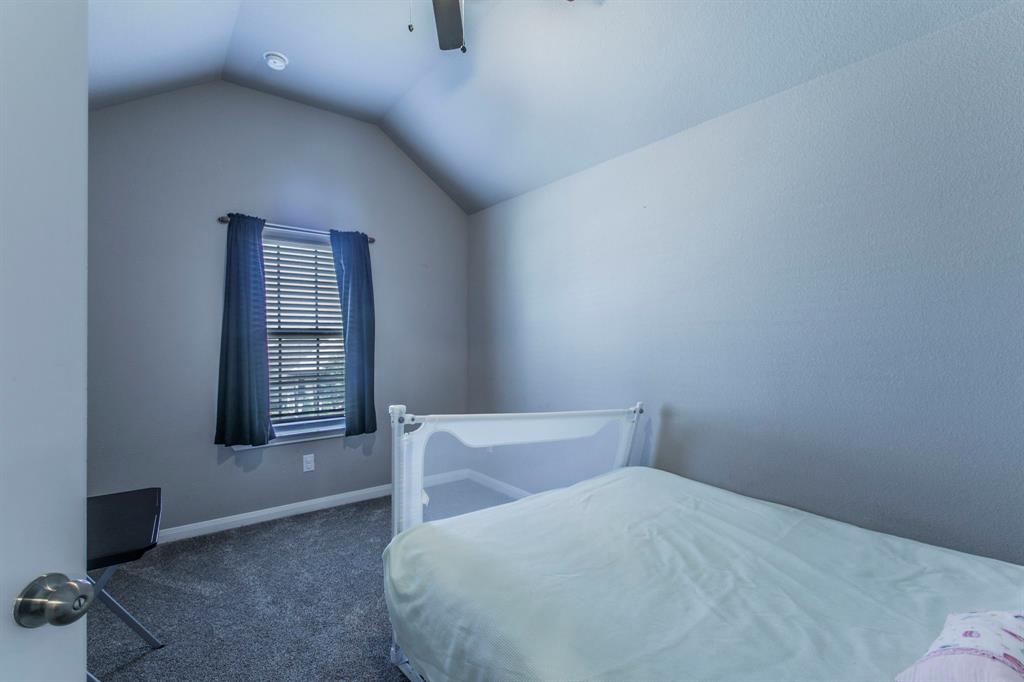 3113 Samson Drive Lorena, TX 76655 - Photo 14 of 25 a bedroom with a bed and a window