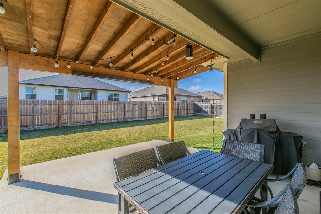 3113 Samson Drive Lorena, TX 76655 - Photo 23 of 25 a view of a patio with wooden floor