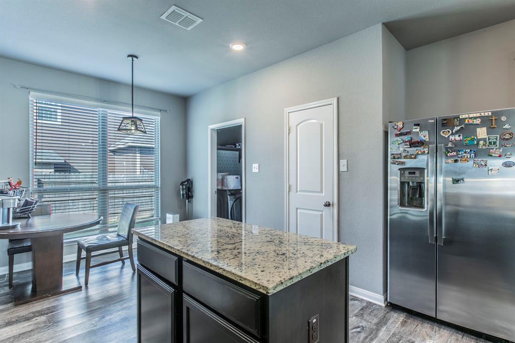 3113 Samson Drive Lorena, TX 76655 - Photo 10 of 25 a kitchen with cabinets and refrigerator