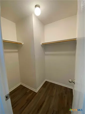 a view of small space with wooden floor