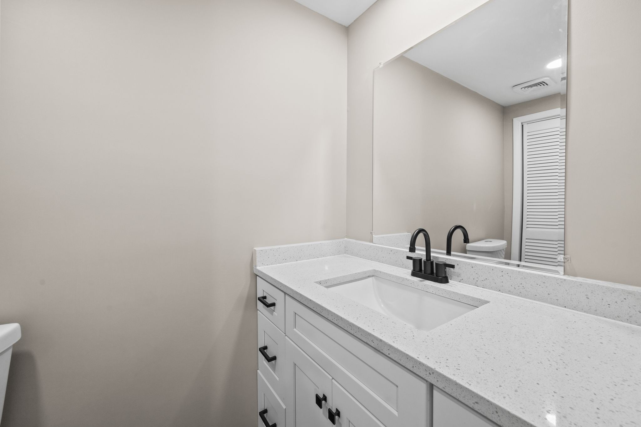 133 Mockerson Road Leoma, TN 38468 - Photo 24 of 33 a bathroom with a sink and a mirror
