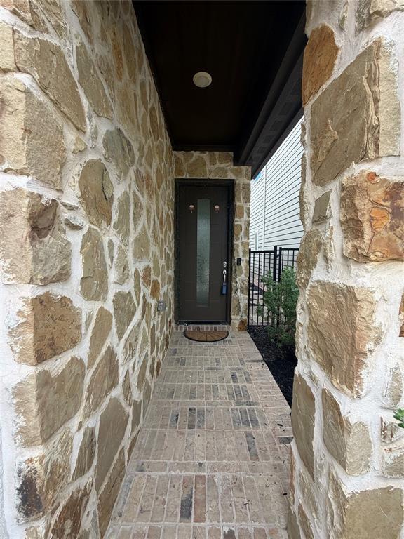 1037 Drew Lane Allen, TX 75013 - Photo 4 of 18 a view of a brick house with a wooden bench