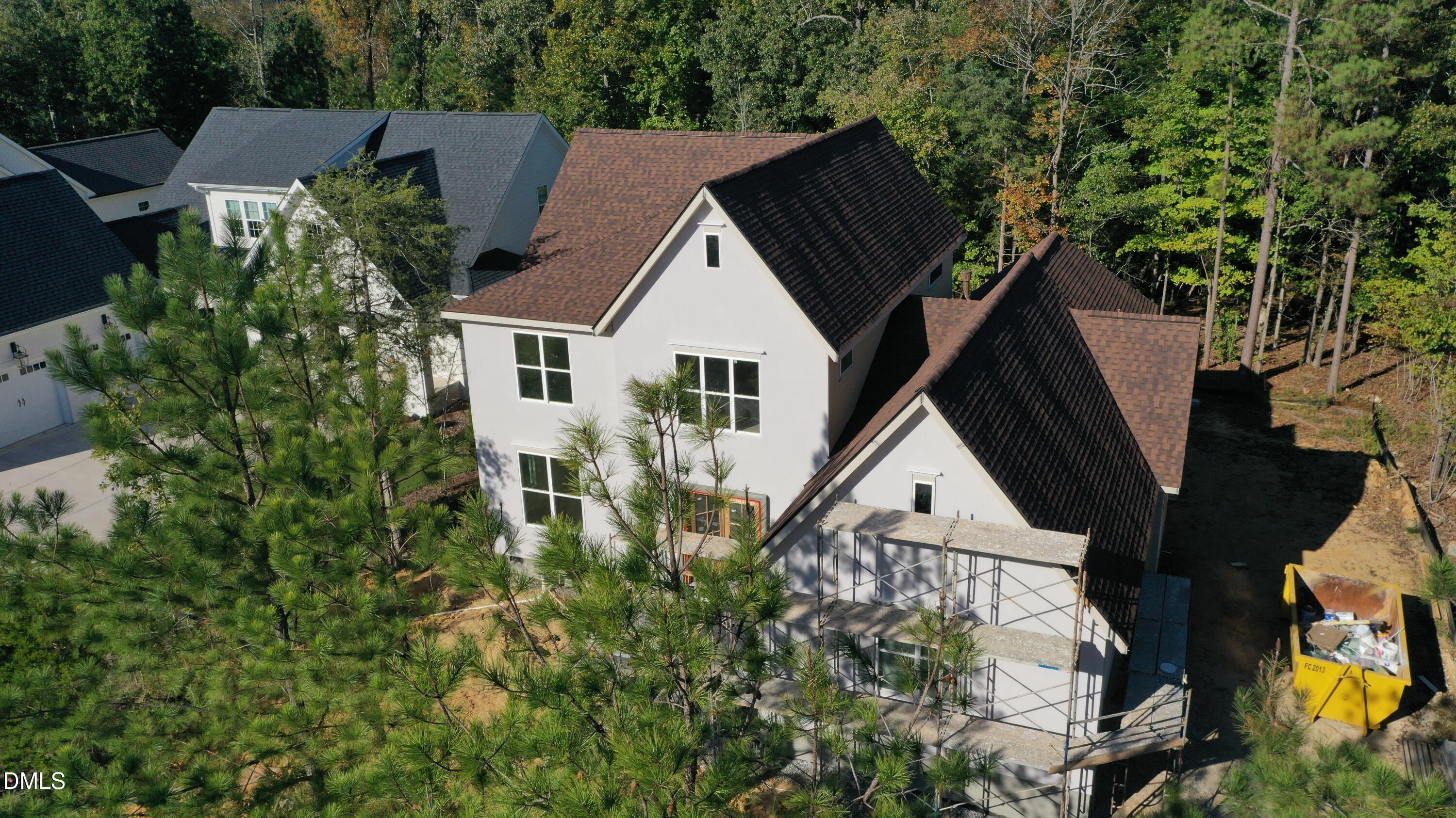 183 Lookout Ridge Pittsboro, NC 27312 - Photo 2 of 8 an aerial view of house with yard and trees in the background