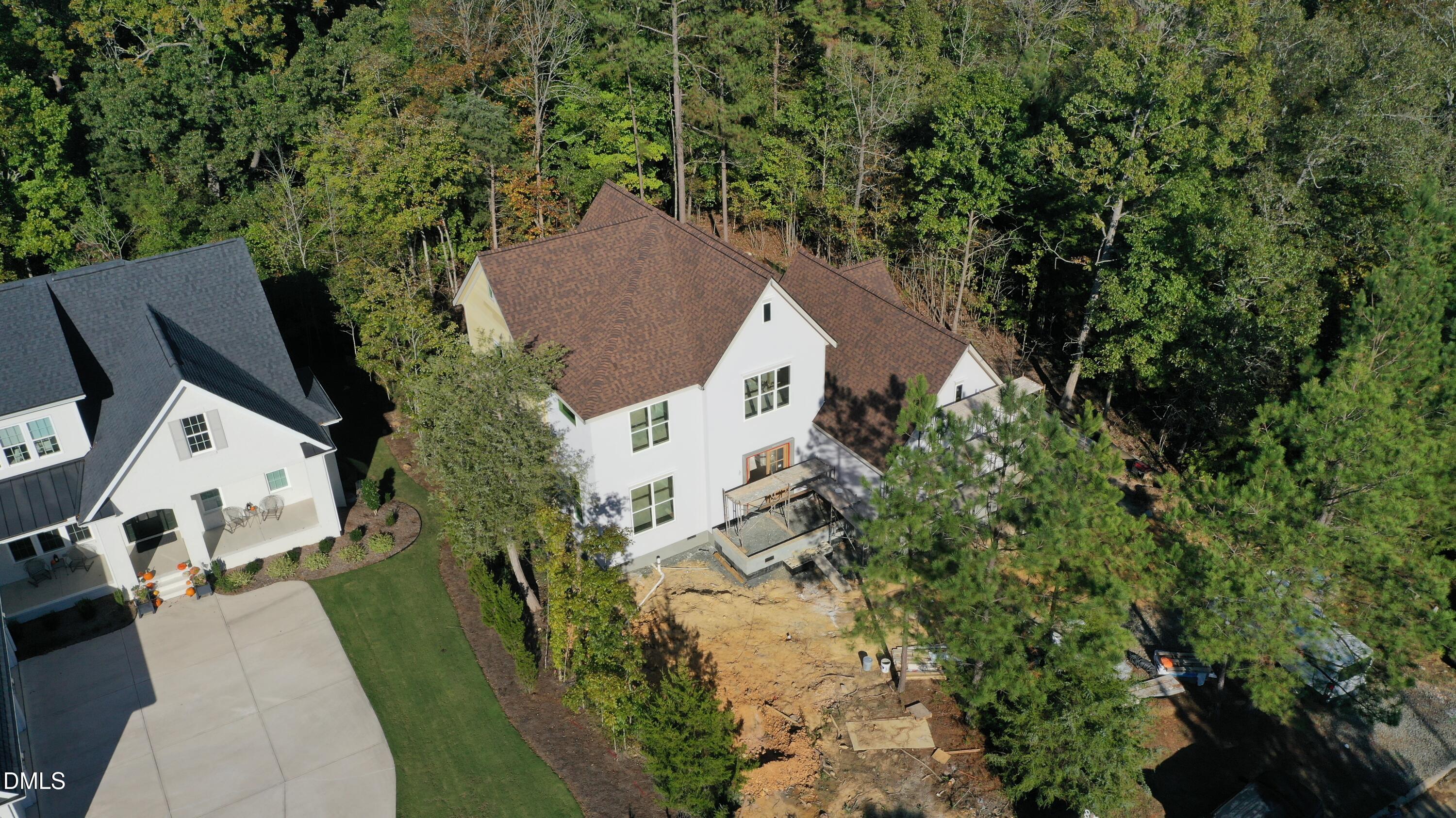 183 Lookout Ridge Pittsboro, NC 27312 - Photo 3 of 8 an aerial view of a house with a yard and garden