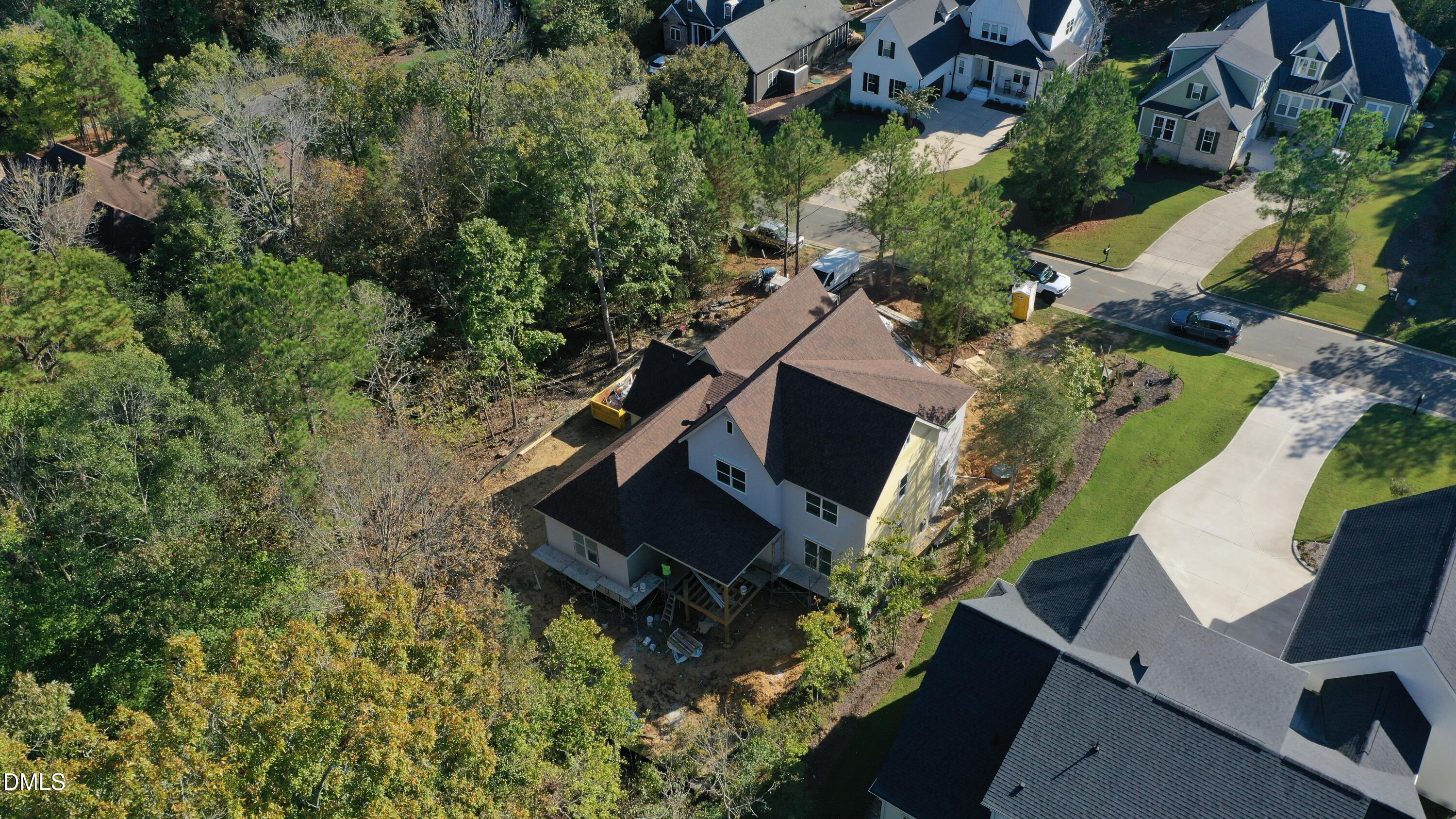 183 Lookout Ridge Pittsboro, NC 27312 - Photo 4 of 8 an aerial view of a house with a yard