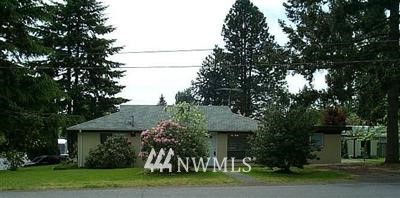 3901 Northeast 7th Street Renton, WA 98056 - Photo 1 of 1 a front view of a house with a garden