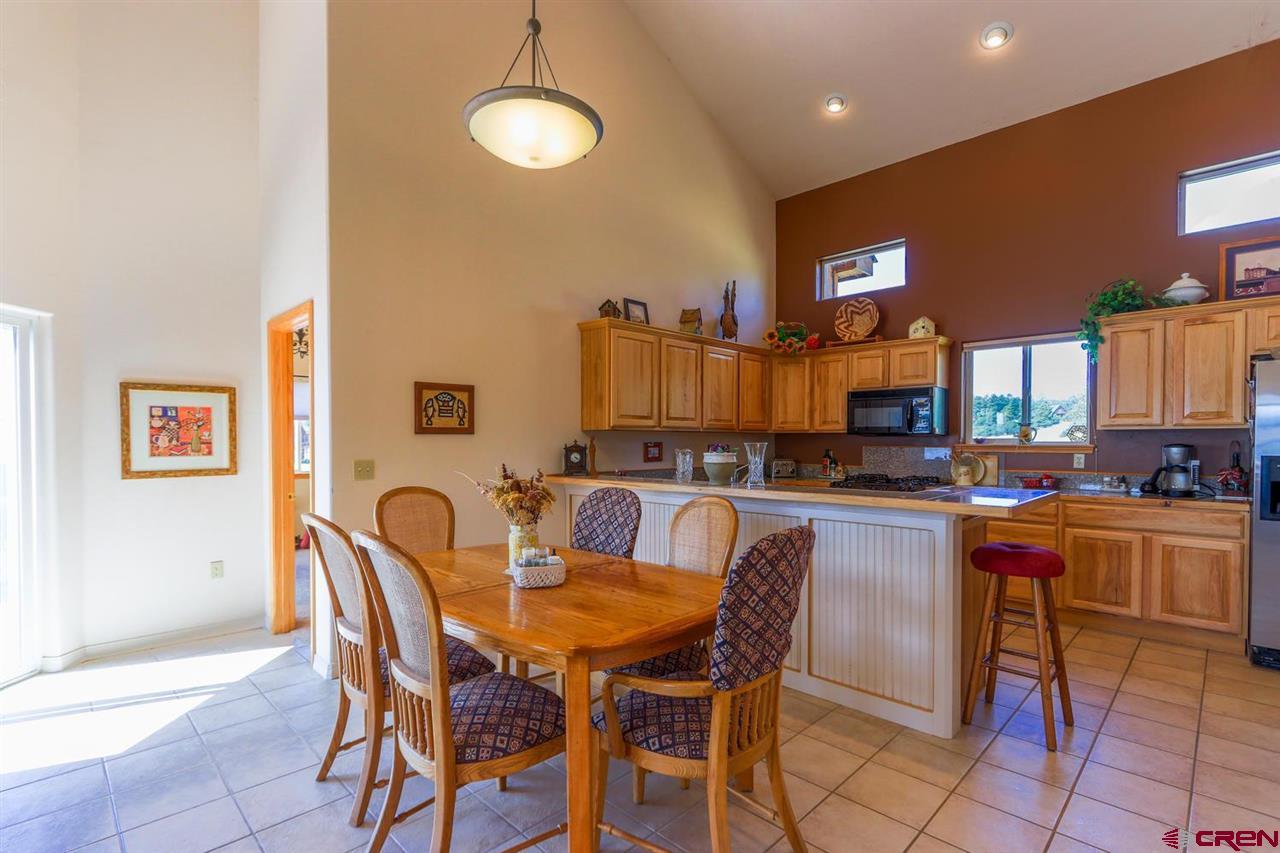 75 Pebble Circle Pagosa Springs, CO 81147 - Photo 11 of 30 a view of a dining room with furniture