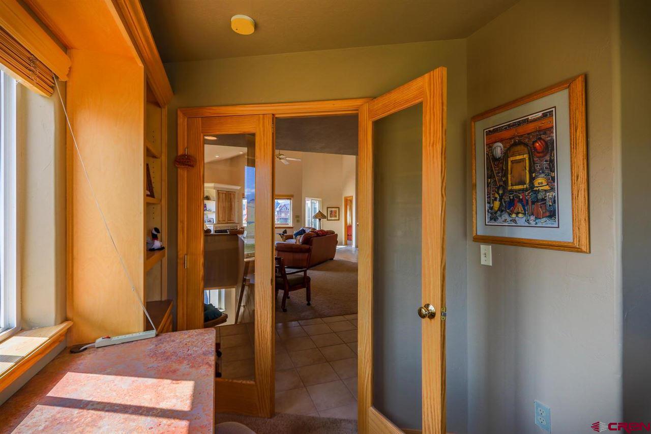 75 Pebble Circle Pagosa Springs, CO 81147 - Photo 27 of 30 a view of a hallway with living room