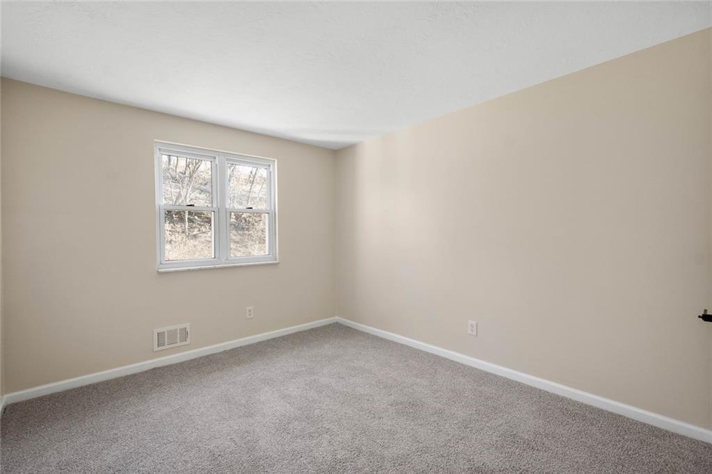 402 Forest Ridge Drive Pittsburgh, PA 15221 - Photo 23 of 35 an empty room with windows