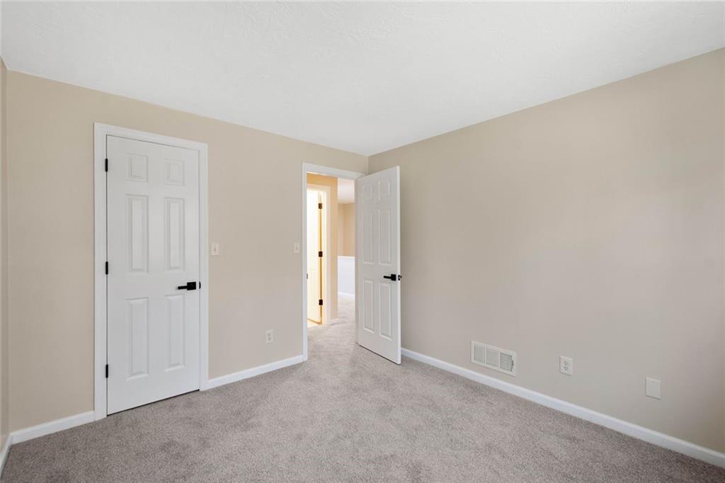 402 Forest Ridge Drive Pittsburgh, PA 15221 - Photo 24 of 35 a view of an empty room and closet area