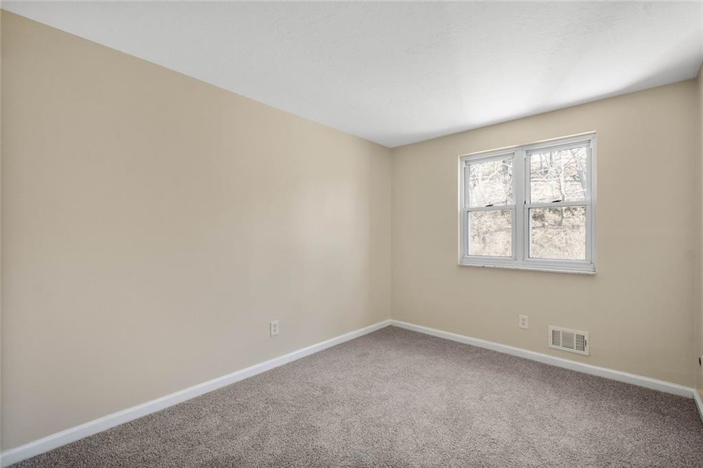 402 Forest Ridge Drive Pittsburgh, PA 15221 - Photo 28 of 35 an empty room with windows