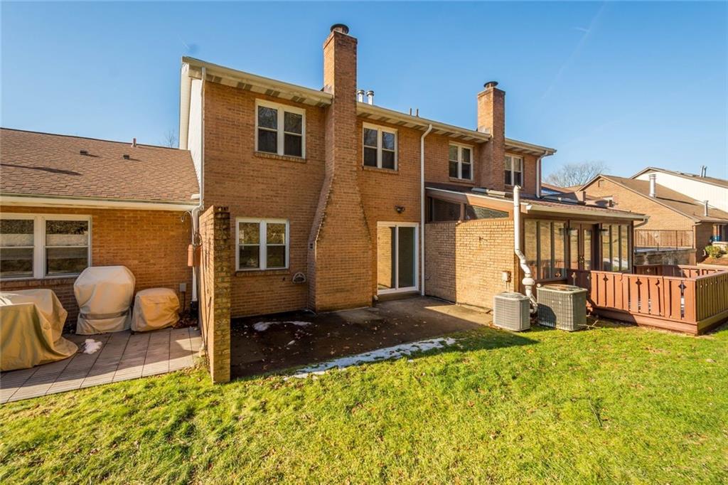 402 Forest Ridge Drive Pittsburgh, PA 15221 - Photo 32 of 35 a front view of a house with patio