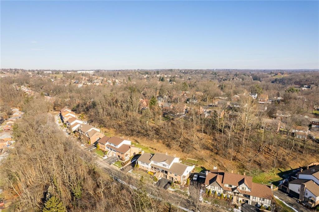 402 Forest Ridge Drive Pittsburgh, PA 15221 - Photo 34 of 35 an aerial view of residential house and covered with trees