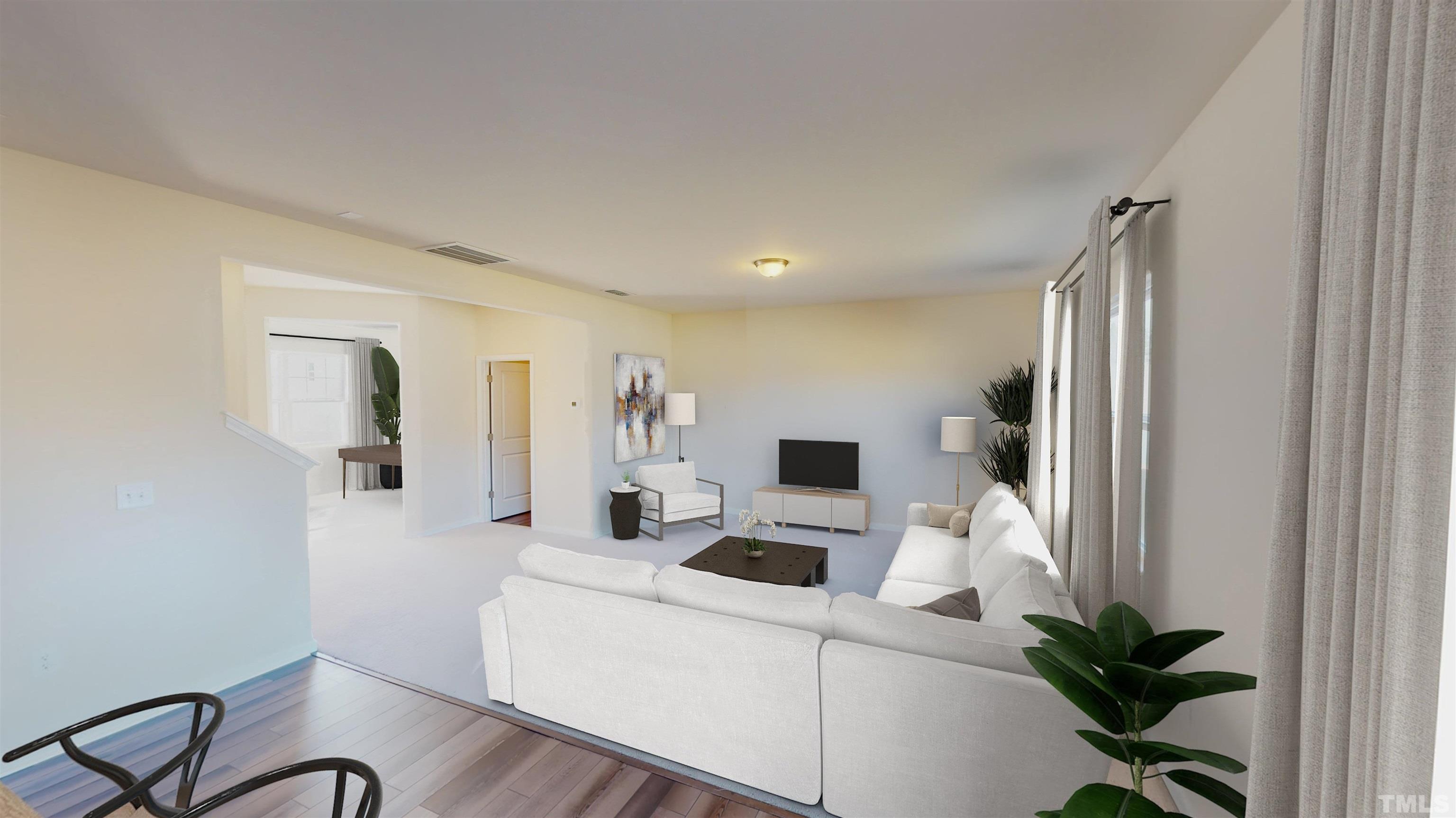 3429 Dragonfly River Raleigh, NC 27604 - Photo 11 of 27 a living room with furniture and a flat screen tv