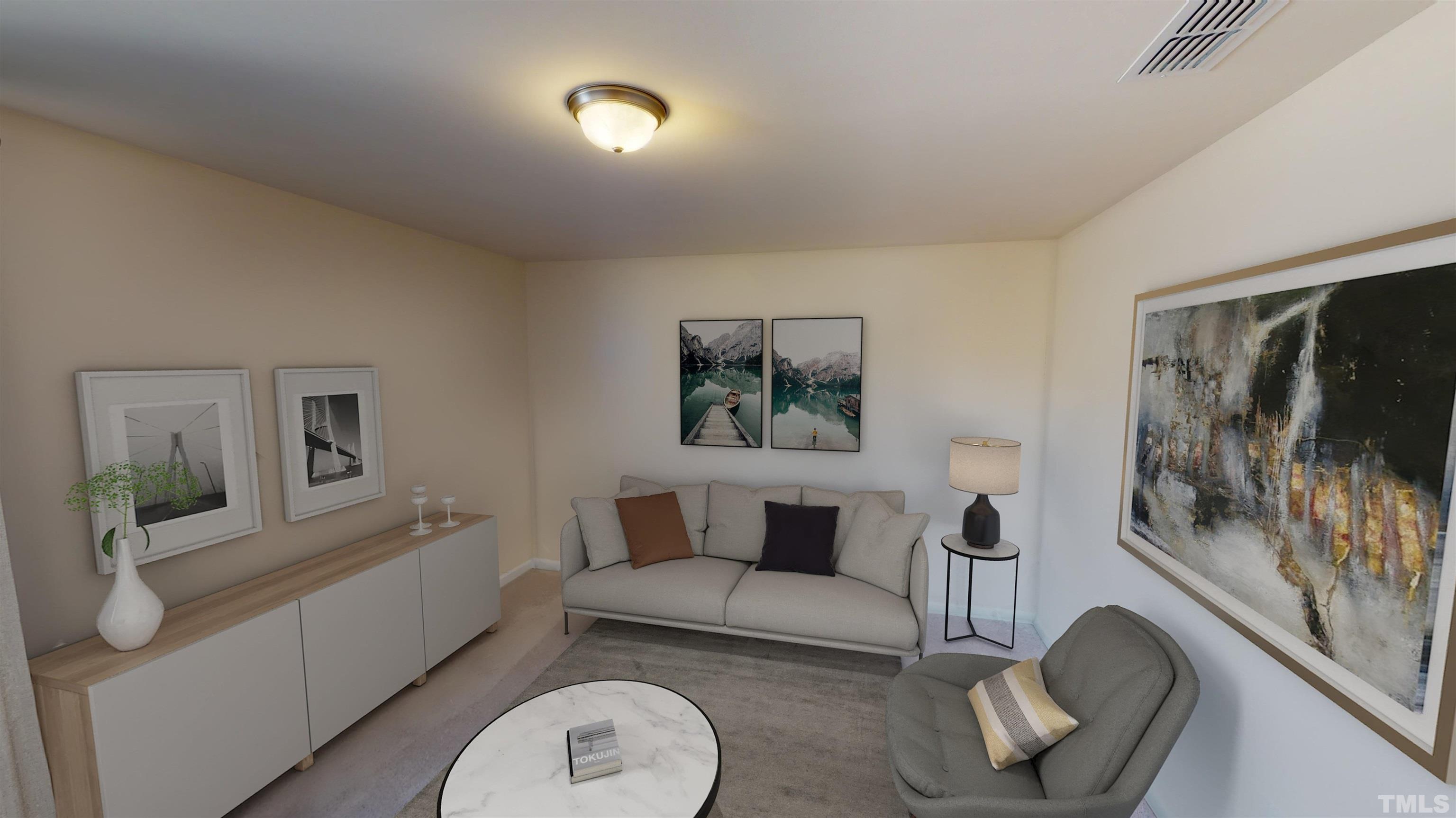 3429 Dragonfly River Raleigh, NC 27604 - Photo 16 of 27 a living room with furniture and a flat screen tv