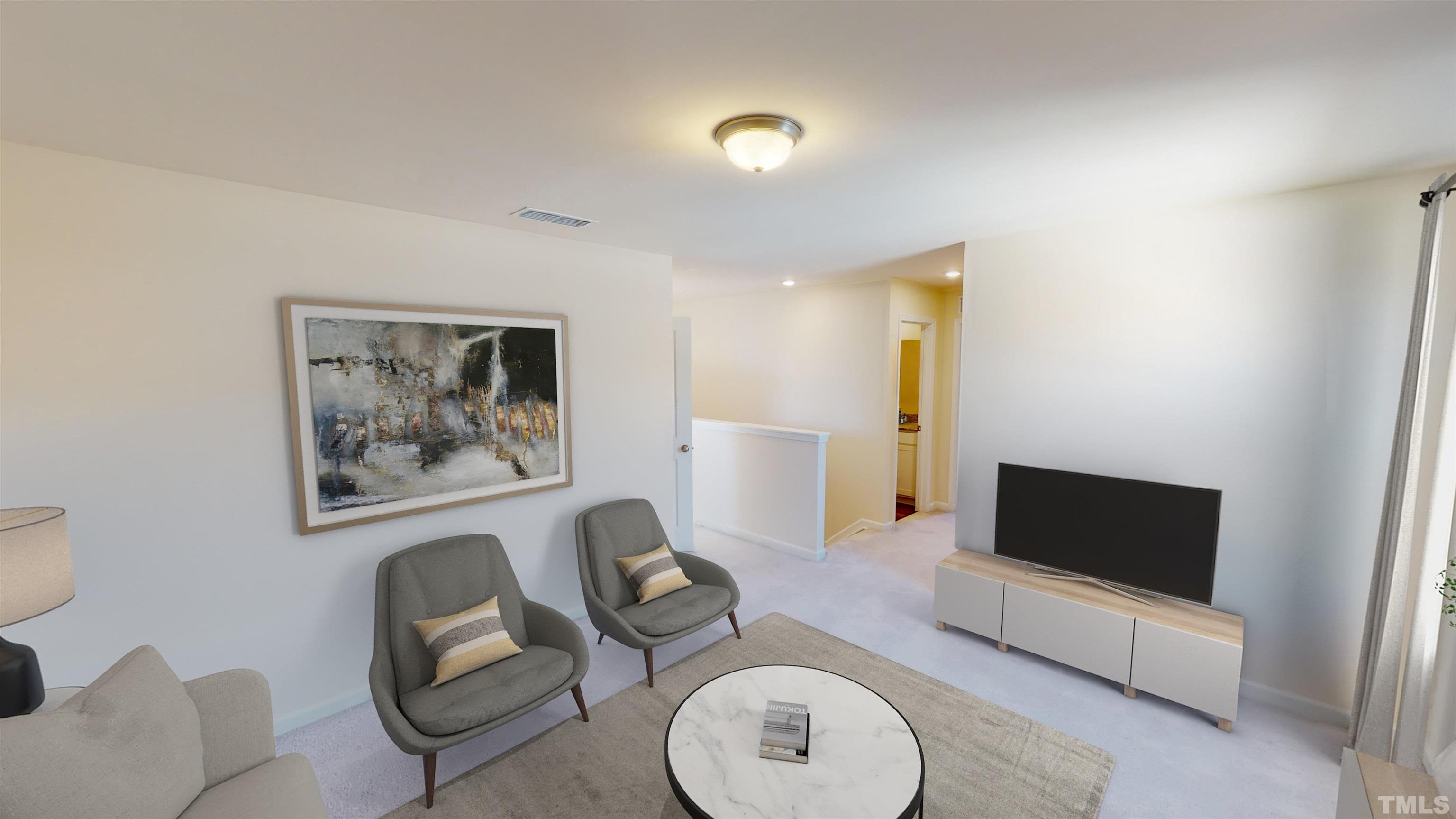 3429 Dragonfly River Raleigh, NC 27604 - Photo 17 of 27 a living room with furniture and a flat screen tv