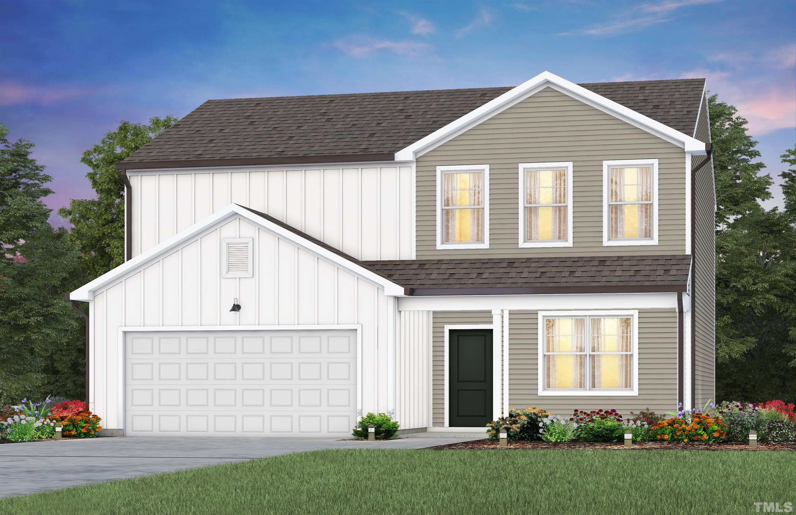 3429 Dragonfly River Raleigh, NC 27604 - Photo 25 of 27 a front view of a house with a garden