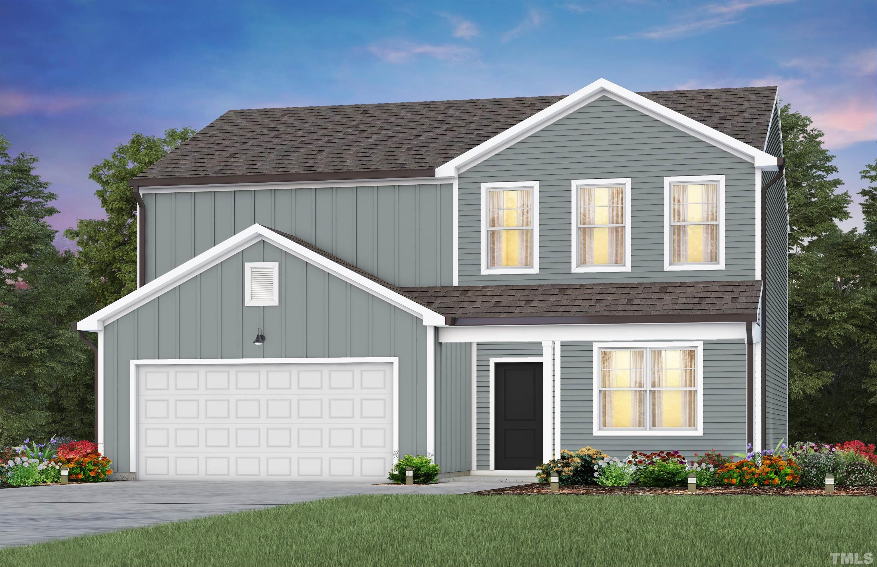 3429 Dragonfly River Raleigh, NC 27604 - Photo 26 of 27 a front view of a house with a yard and garage