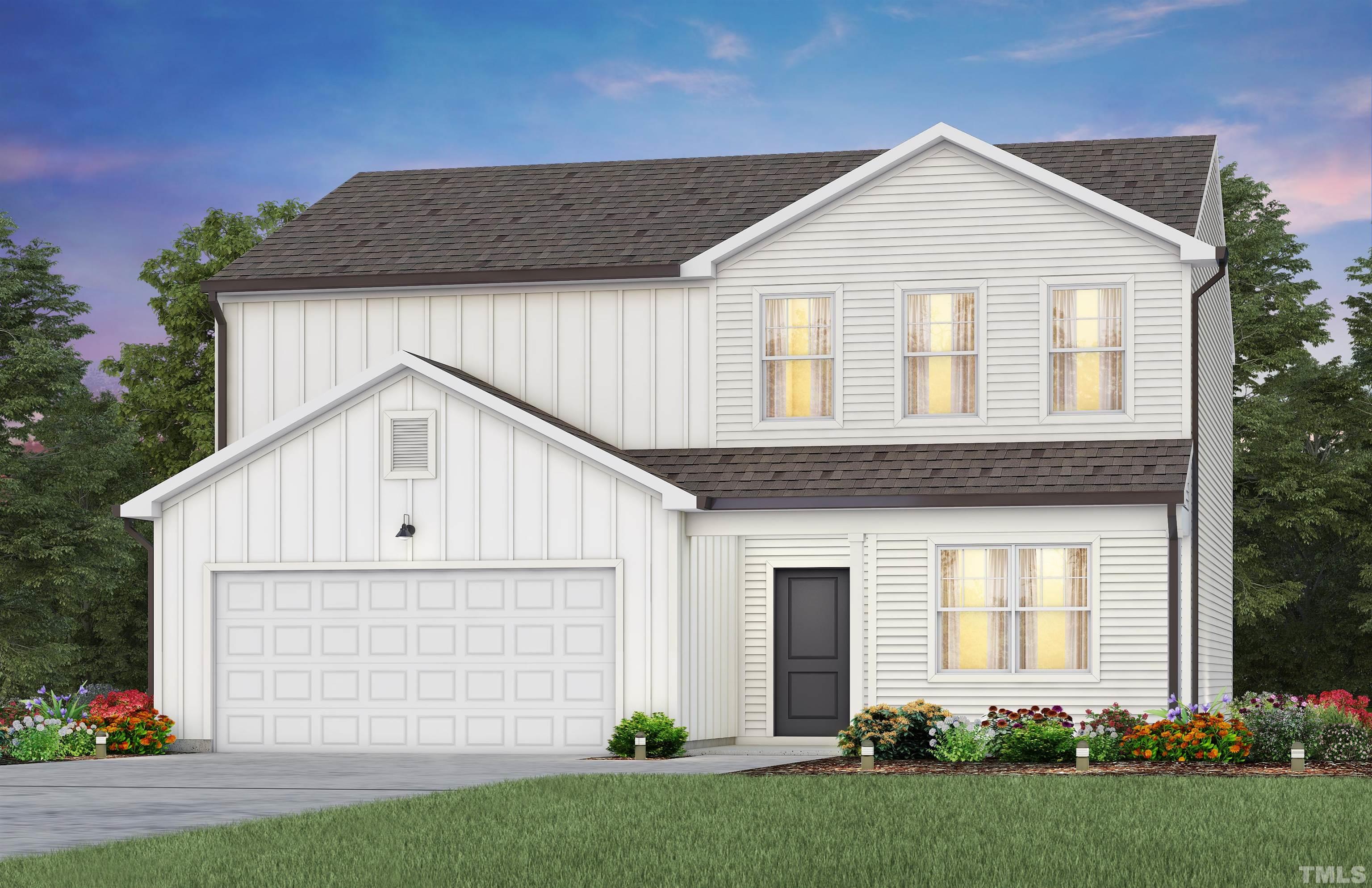 3429 Dragonfly River Raleigh, NC 27604 - Photo 27 of 27 a front view of a house with a garden and plants