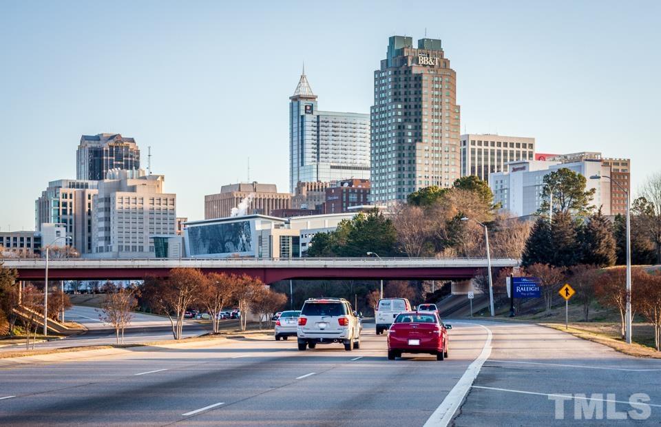 3429 Dragonfly River Raleigh, NC 27604 - Photo 6 of 27 a car parked in front of a building