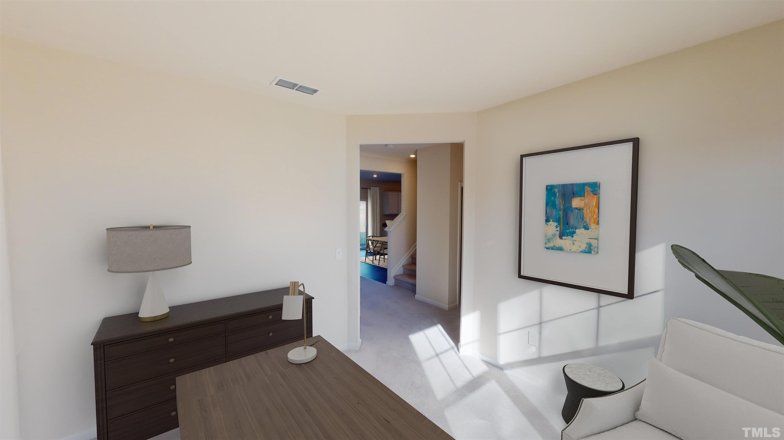 3429 Dragonfly River Raleigh, NC 27604 - Photo 9 of 27 a bedroom with a bed and a lamp on table