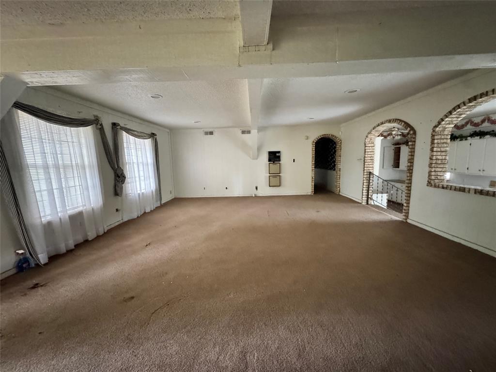 3909 Smothers Road Caney City, TX 75148 - Photo 9 of 35 a view of empty room with windows