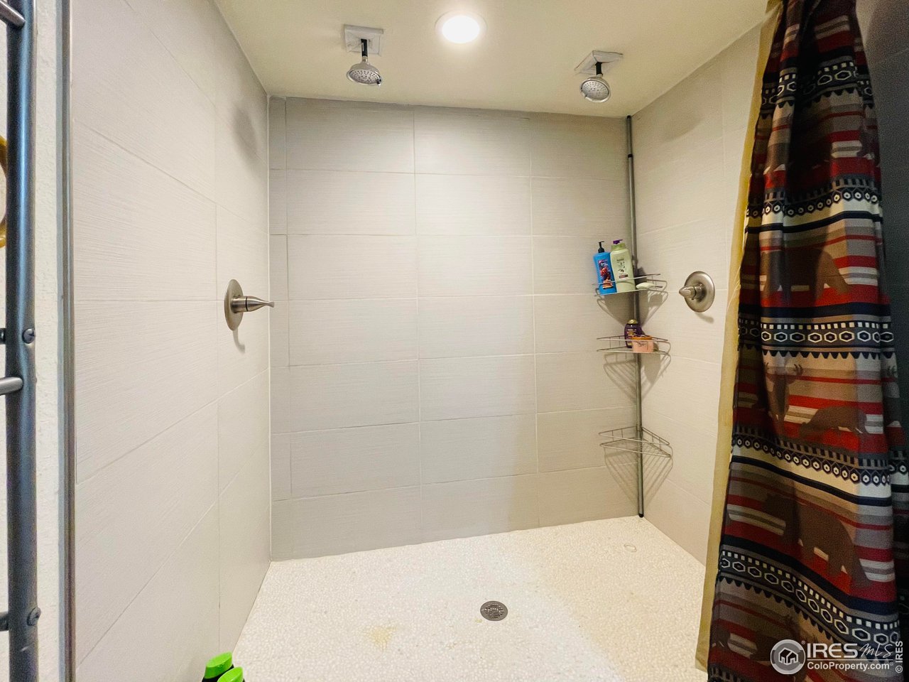 421 East 28th St Road Greeley, CO 80631 - Photo 20 of 30 Gigantic 2 showerhead, walk-in shower downstairs!