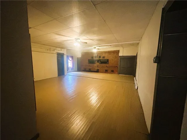a view of empty room with windows