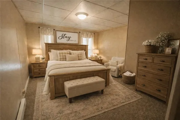 a bedroom with a bed and a dresser
