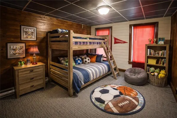 a bedroom with furniture and a bed