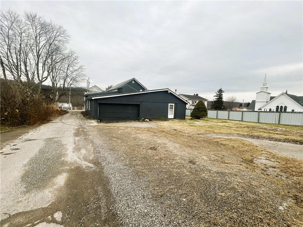 919 Main Street East Rural Valley, PA 16249 - Photo 37 of 37 a view of a house with a yard