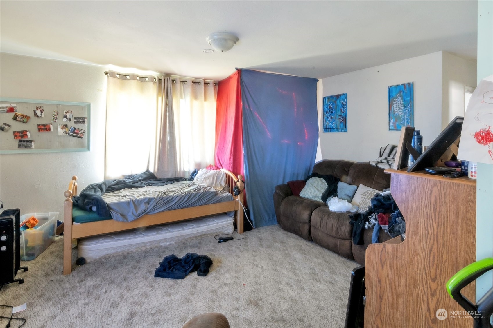 139 Oak Street Bremerton, WA 98310 - Photo 12 of 28 a bedroom with furniture and a window