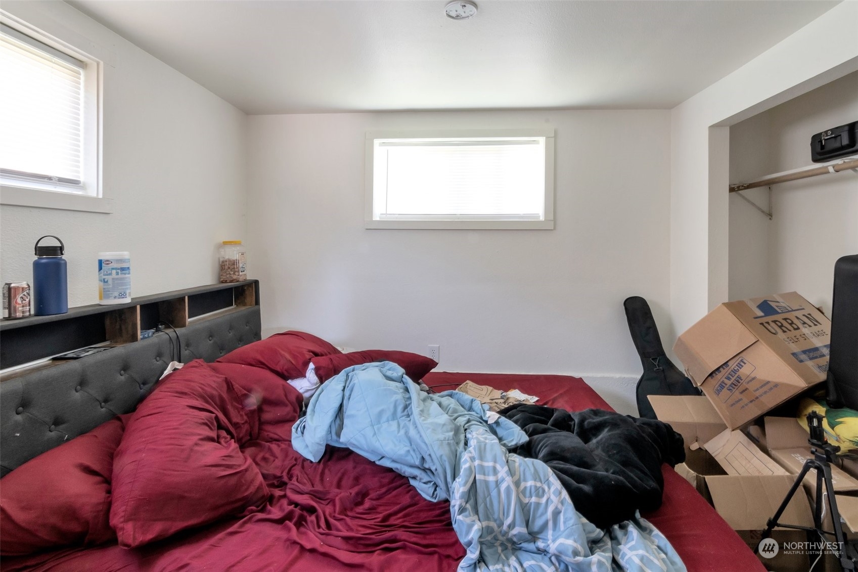 139 Oak Street Bremerton, WA 98310 - Photo 18 of 28 a bedroom with a bed and a chair