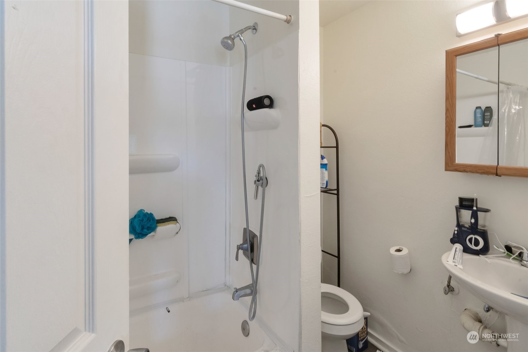 139 Oak Street Bremerton, WA 98310 - Photo 20 of 28 a bathroom with a shower a toilet and a shower