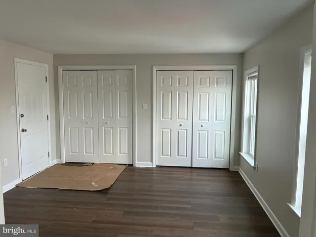 a view of wooden floor and staircase