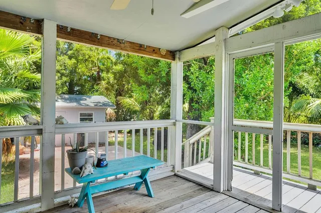 a view of balcony with furniture